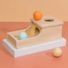 Montessori Ball Drop Box: wooden object permanence box with tray and three balls